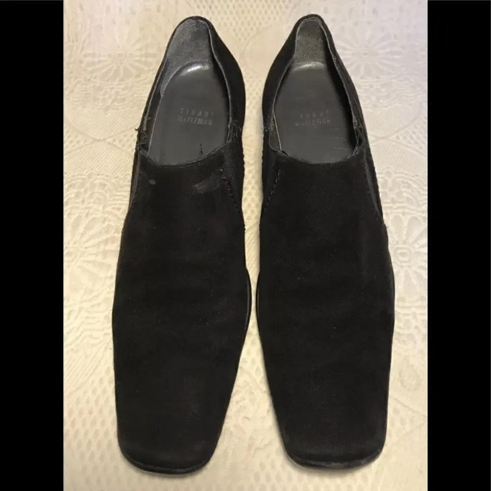 Stuart Weitzman black suede slip ons